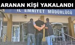 Silahla yağma suçundan aranıyordu