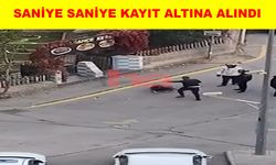 Mahalle kavgasında yerde yatan şahsı defalarca tekmeledi